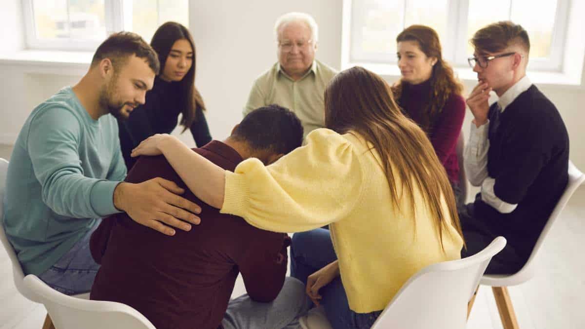group meeting during intervention, offering insights into how to get someone into rehab.