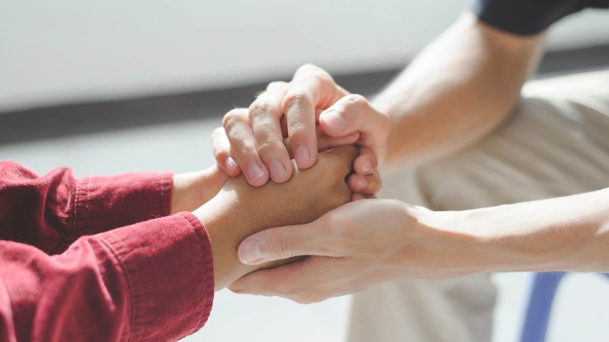 Client receiving support from a professional in our intensive outpatient program in Atlanta, GA at Empowered Recovery Center. 