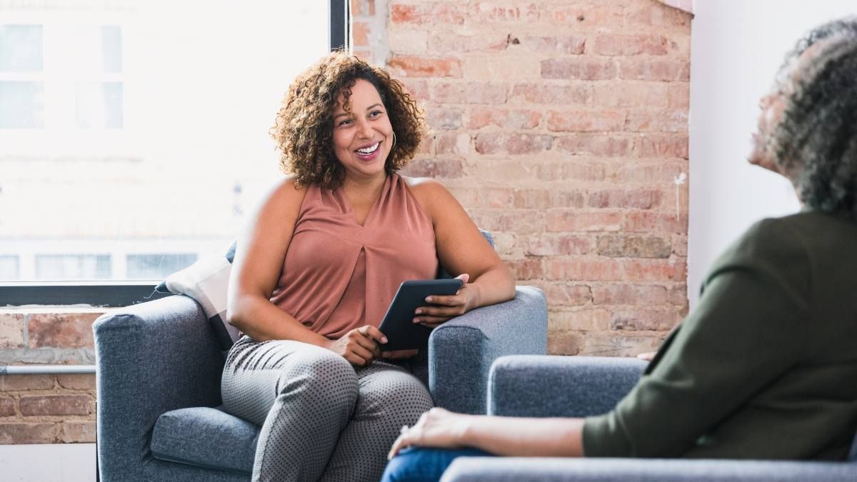 Therapist talking to a client during an intensive outpatient program (IOP) in Atlanta. 