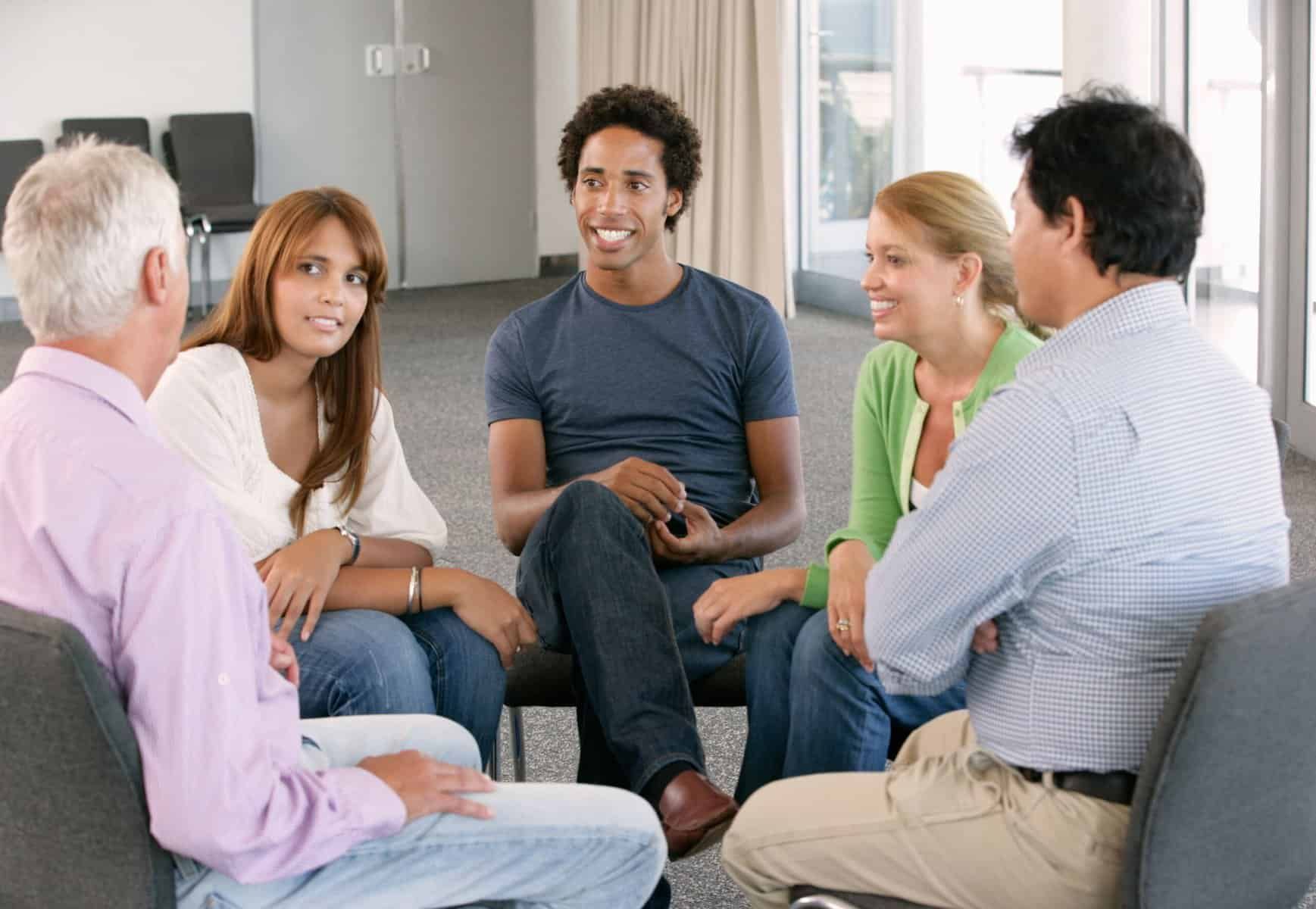 peers meet during alumni program after Atlanta rehab