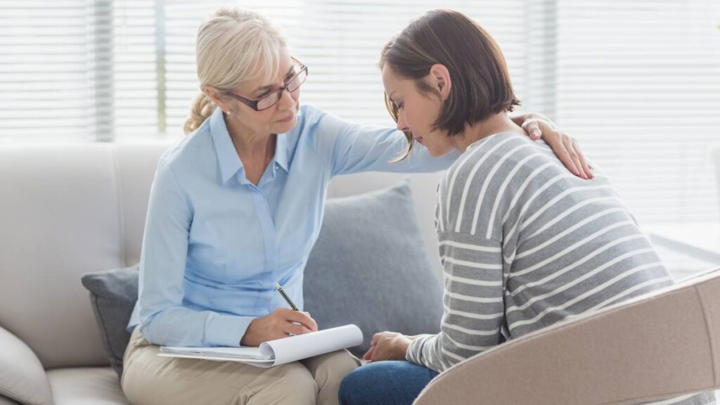 Woman undergoing CBT therapy to understand her impulsive versus intrusive thoughts.