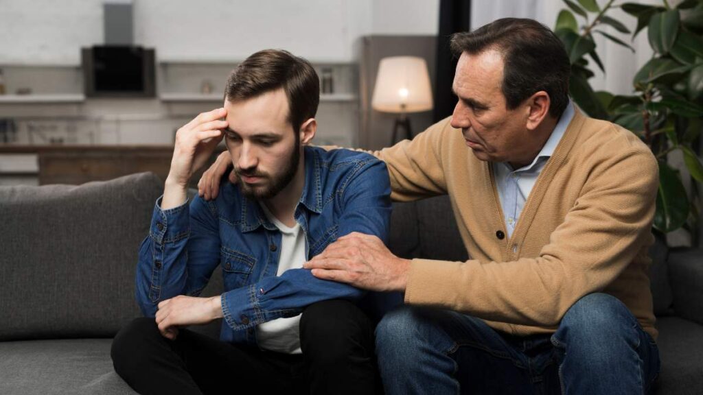A man having a conversation with his son struggling with intrusive and impulsive thoughts.